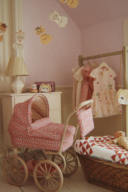 Minnie Doll Pram, Felice Rose
